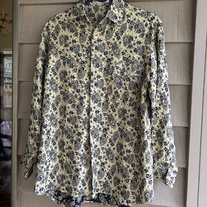 A sells Indonesia Floral Button-Up Shirt blouse. Beige with black floral